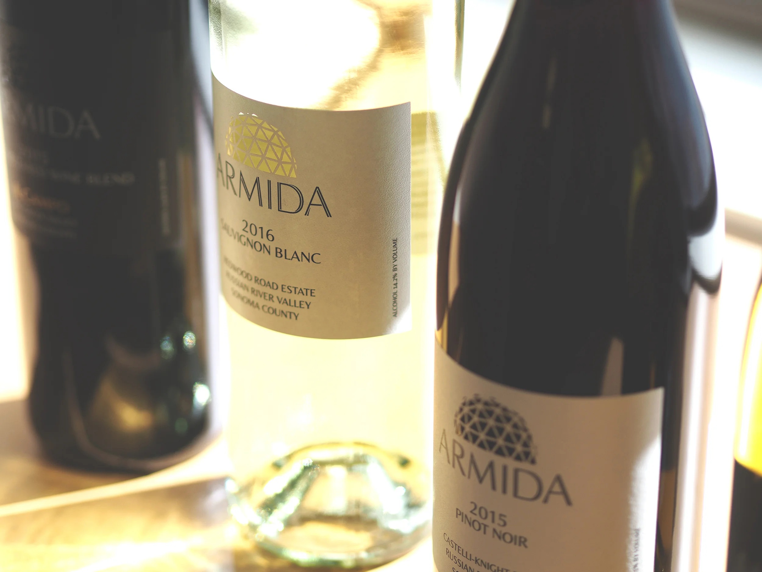 Armida wine bottles with geometric dome icons on their labels