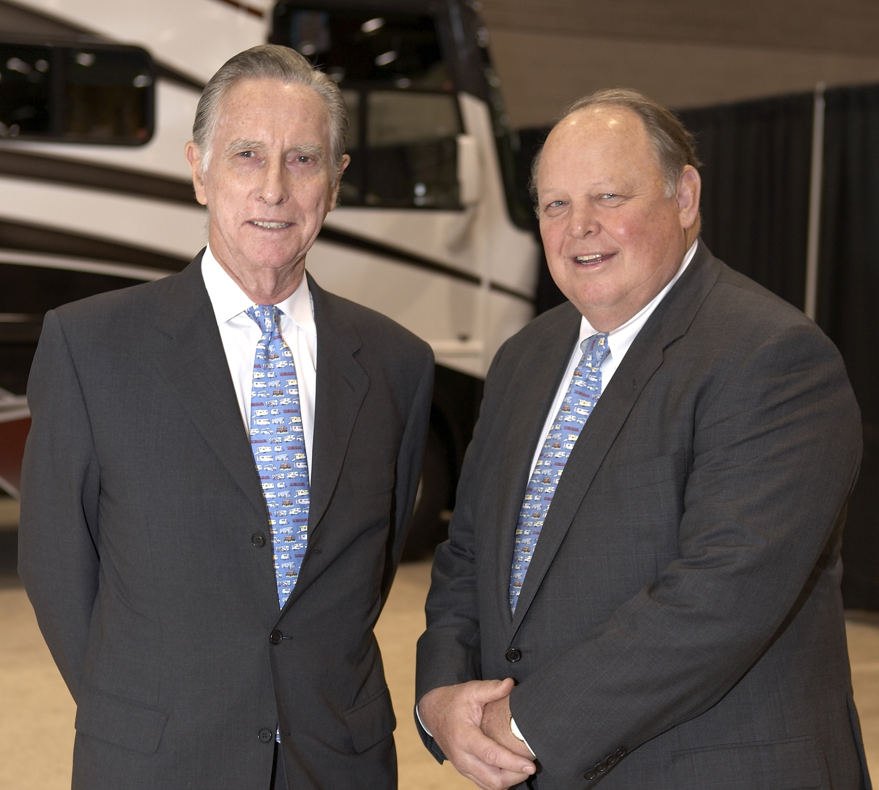THOR founders Wade Thompson and Peter Orthwein standing together in front of an RV