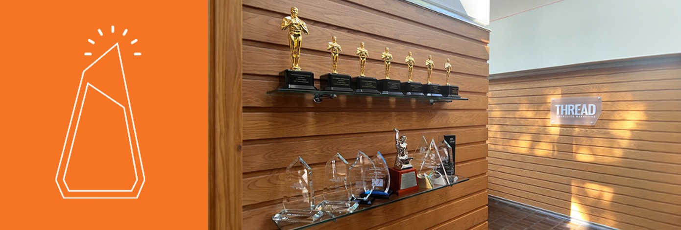 A display of awards earned by Thread Connected Marketing