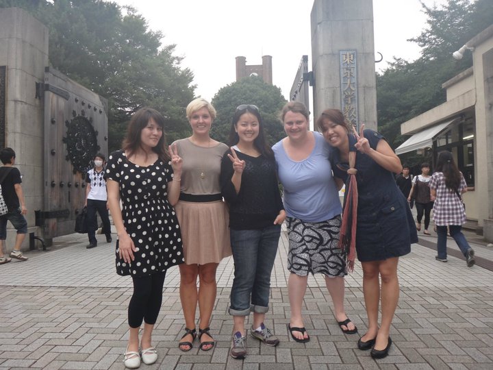 Tiffany Pang, center, with four fellow students outside the University of Tokyo gates