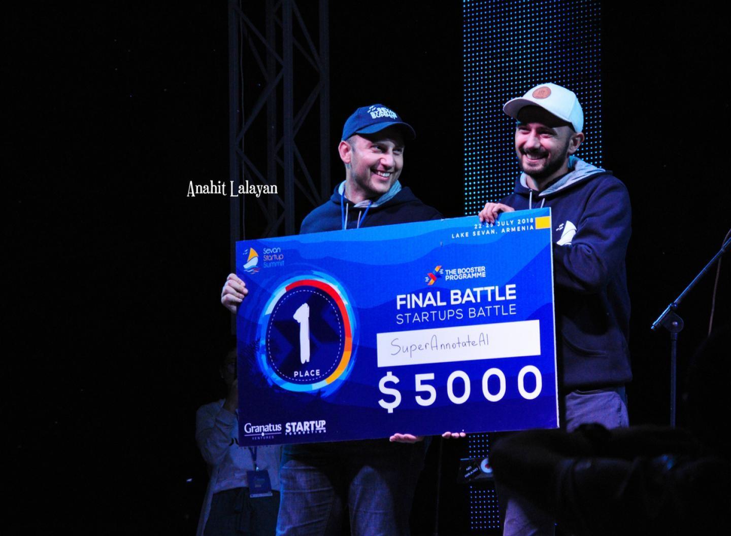 SuperAnnotate team members holding a first-place award at Sevan Startup Summit in July 2018