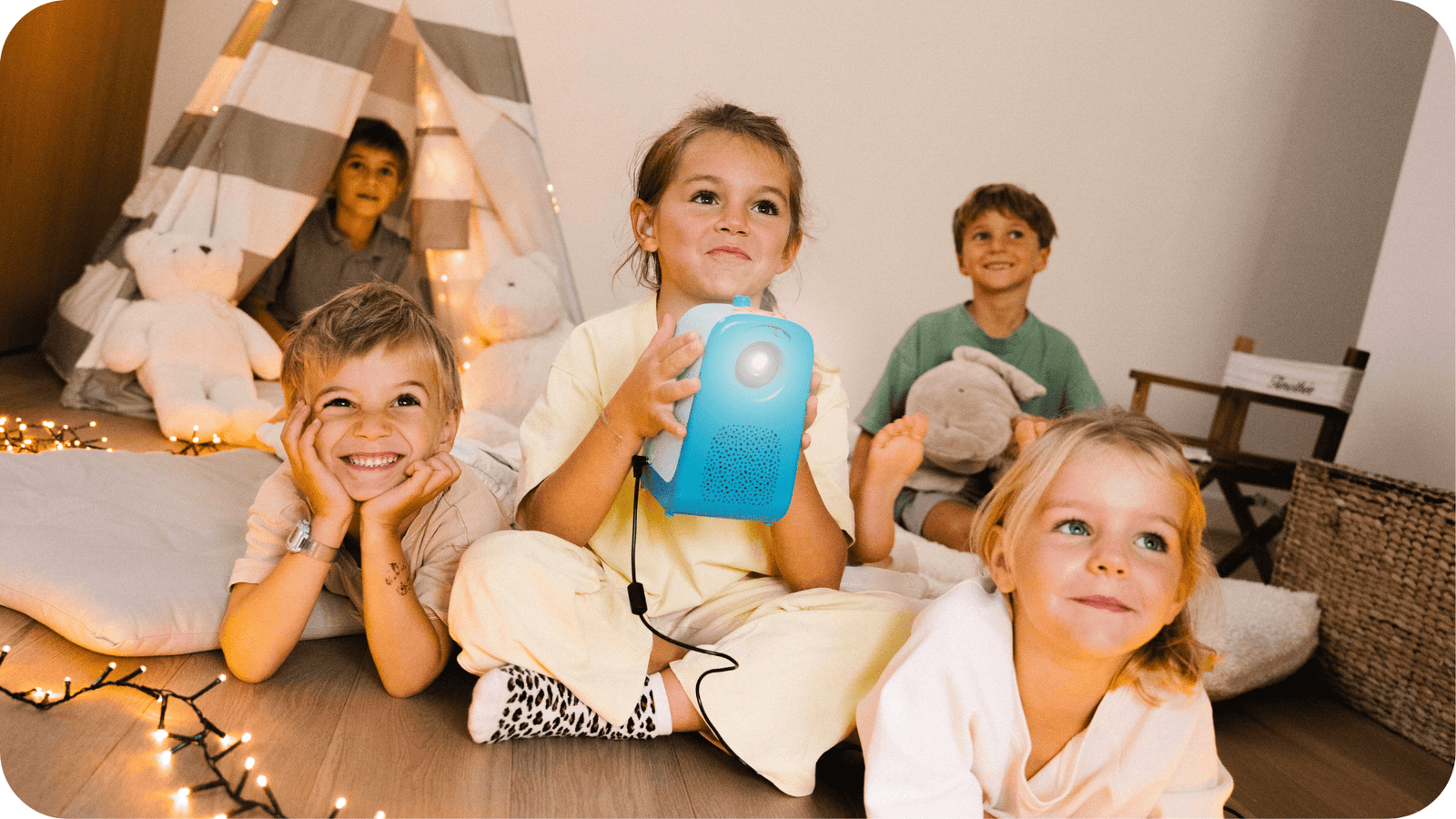 A child watching a story projected by Tikino
