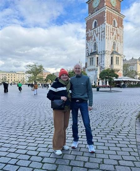 Tim Burr and Joanna Kusiak standing in a square in Krakow