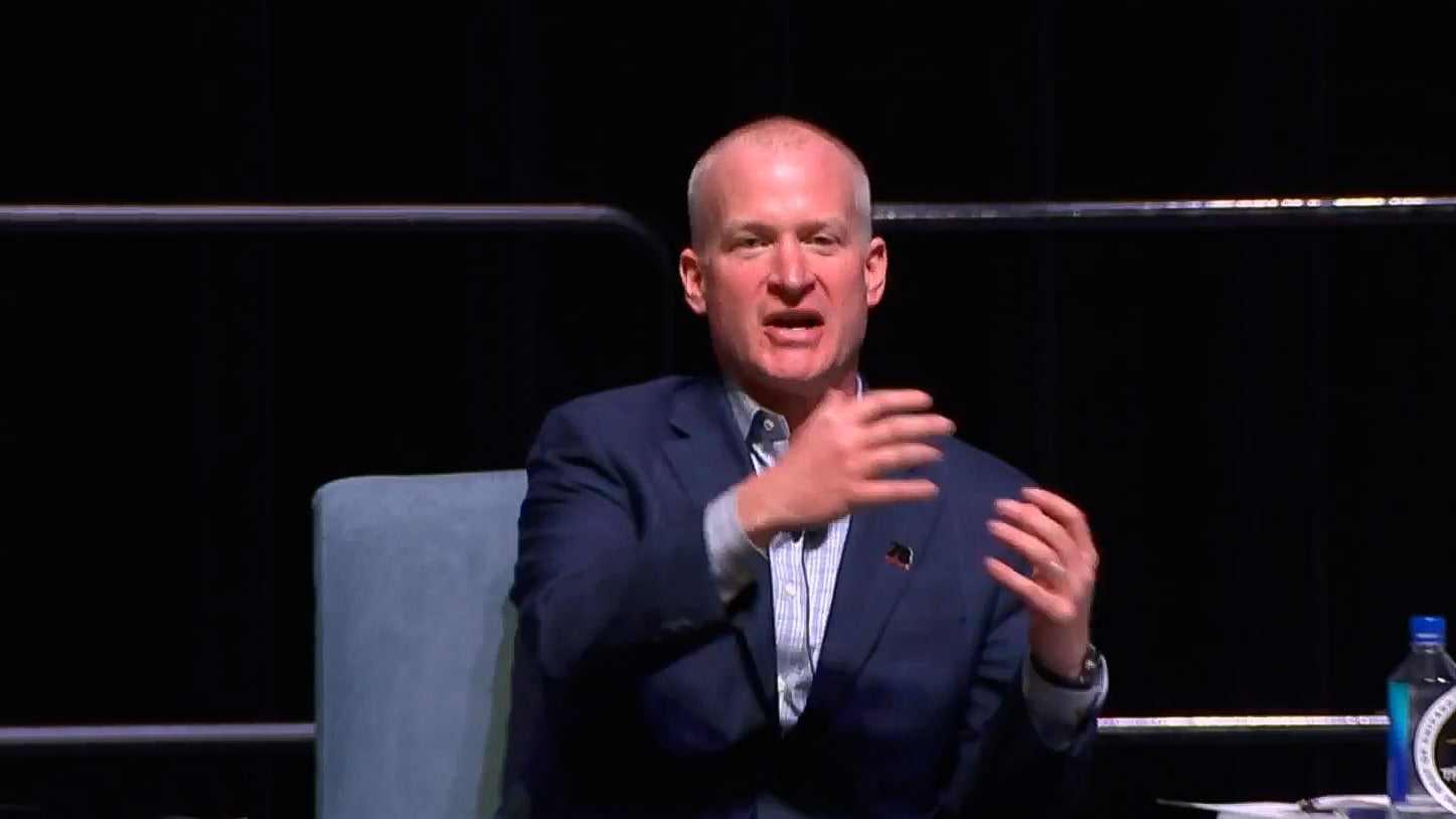 Tim Drehkoff gestures while speaking at the Rivers 78 public meeting in Chicago in April 2022