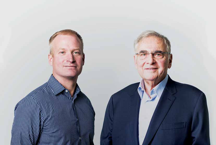 Tim Drehkoff, left, beside Rush Street Gaming founder and chairman Neil Bluhm