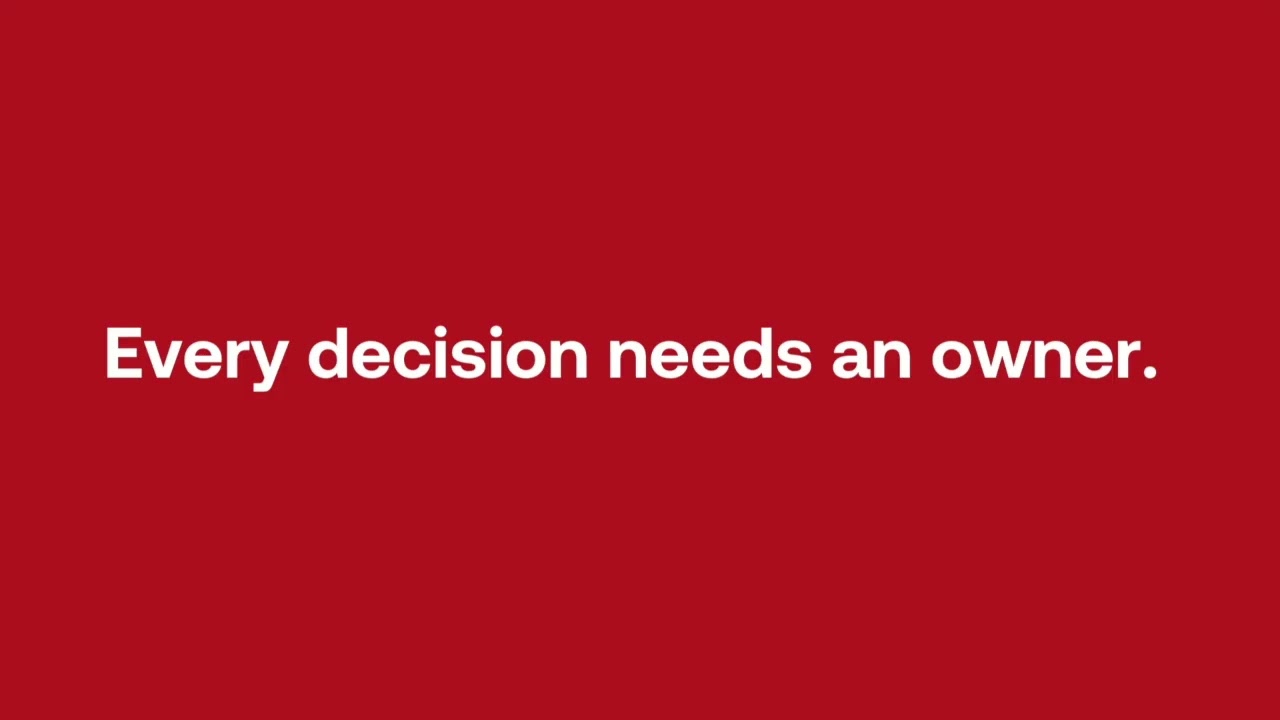 A red title card reading Every decision needs an owner from Who changed this on Tim Krug’s YouTube channel