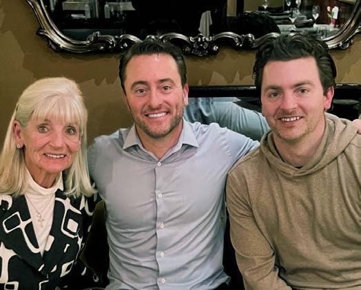 Aunt Maggie, Tim McEnery and Billy seated together