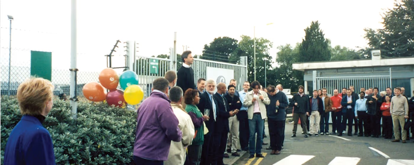 Tim Steiner with Ocado employees at the opening of the company's first customer fulfilment centre