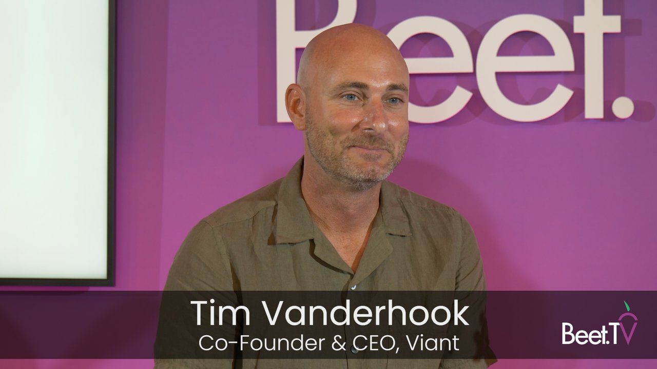 Tim Vanderhook speaking during a Beet.TV interview, wearing an olive shirt