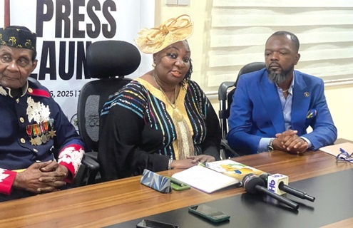 Nyakan June at the center of a conference press briefing in Ghana, with Kofi Okyere Darko on the right