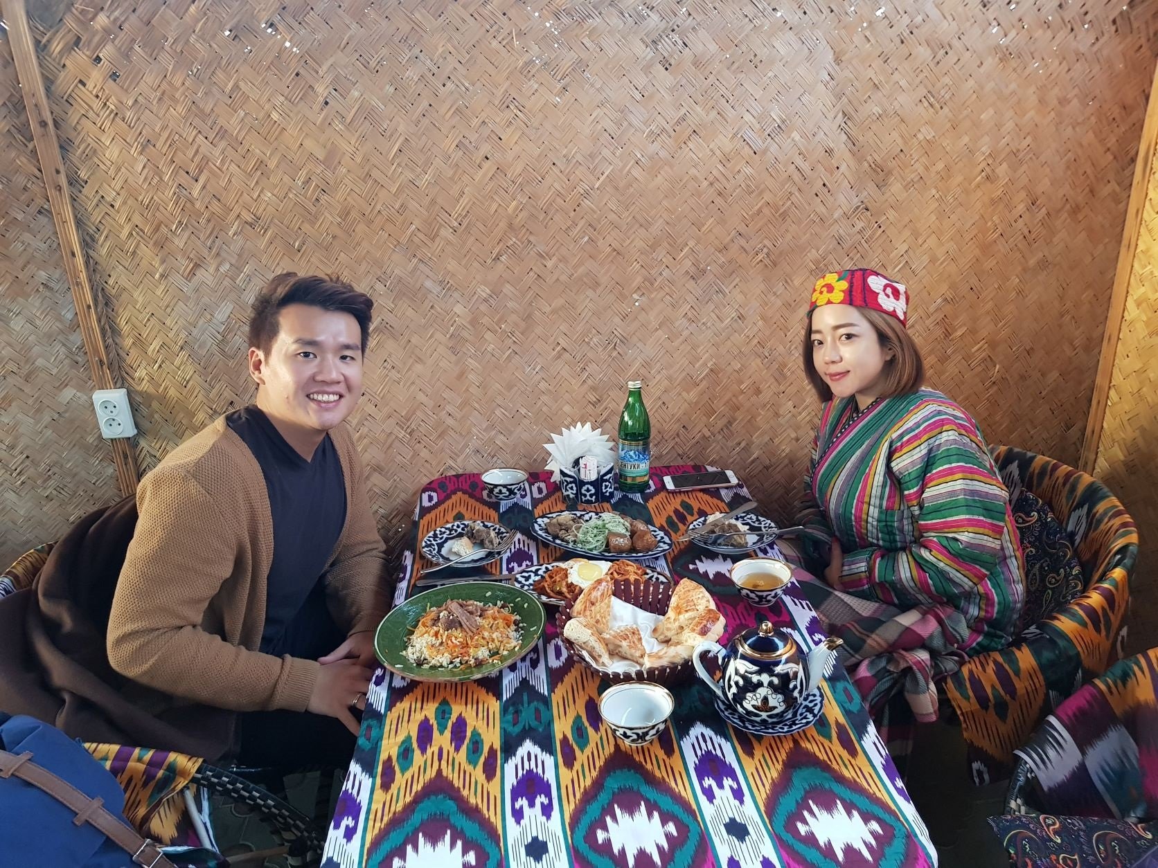 Timothy Astandu sharing a meal in Samarkand, Uzbekistan