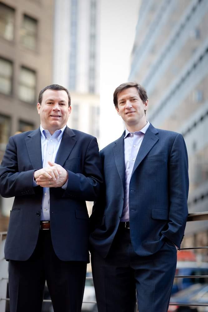 Tim Healy and David Brewster standing together outdoors