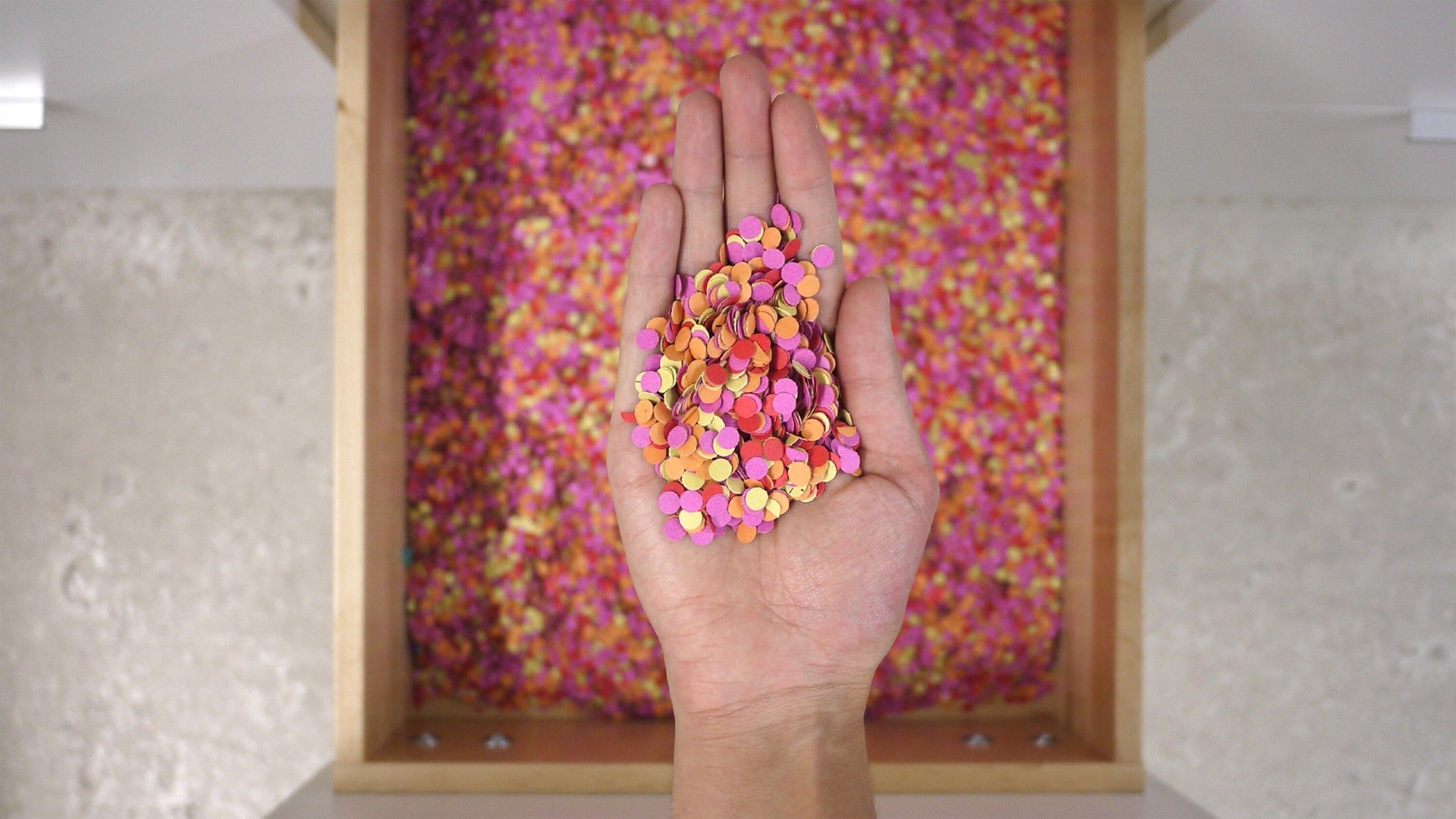A drawer in Tina Roth Eisenberg's office filled with colorful paper confetti