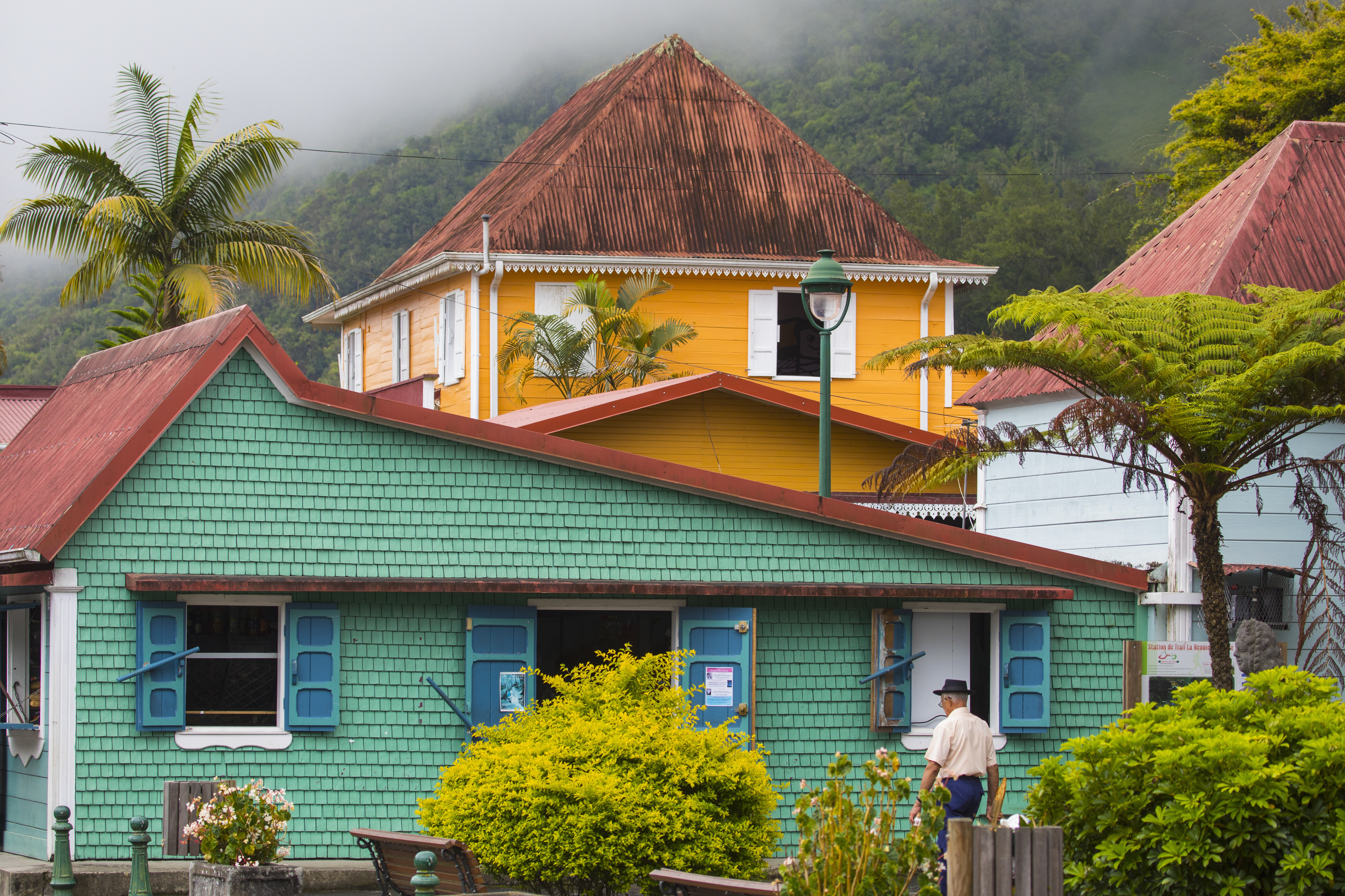 Colorful houses used to illustrate Tint's property and travel insurance market