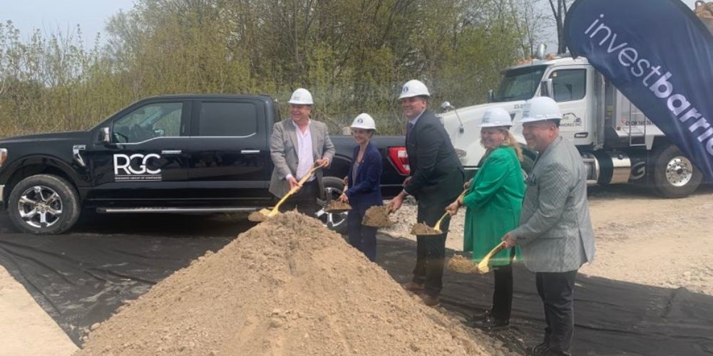 Participants wearing hard hats at the Bayview Point development announcement in Barrie