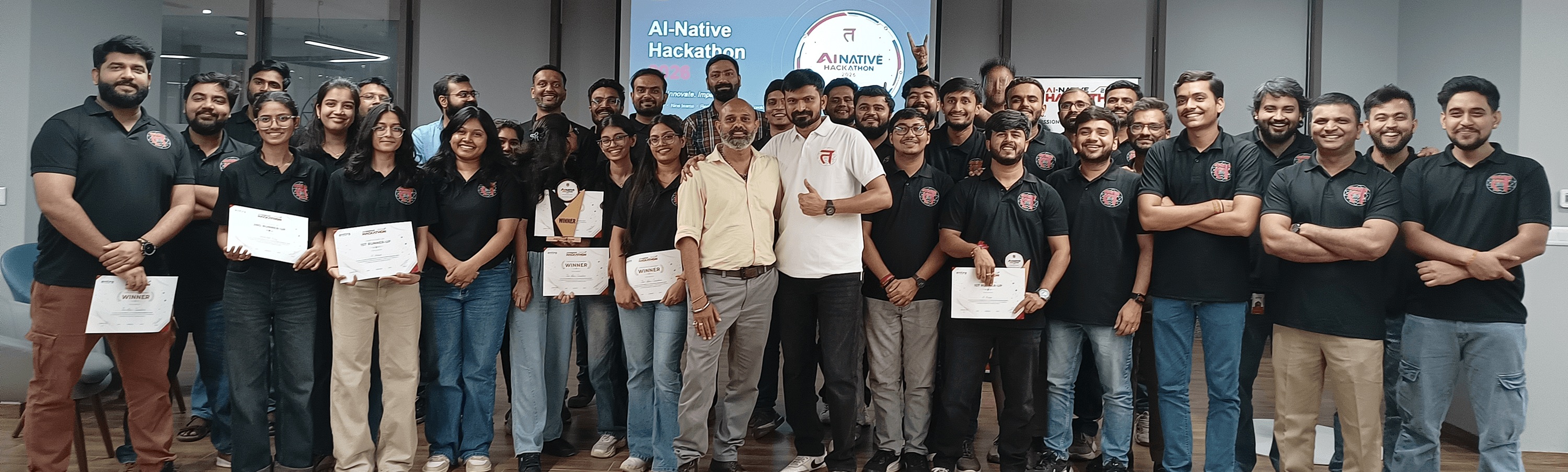 Tntra team gathered at an awards celebration