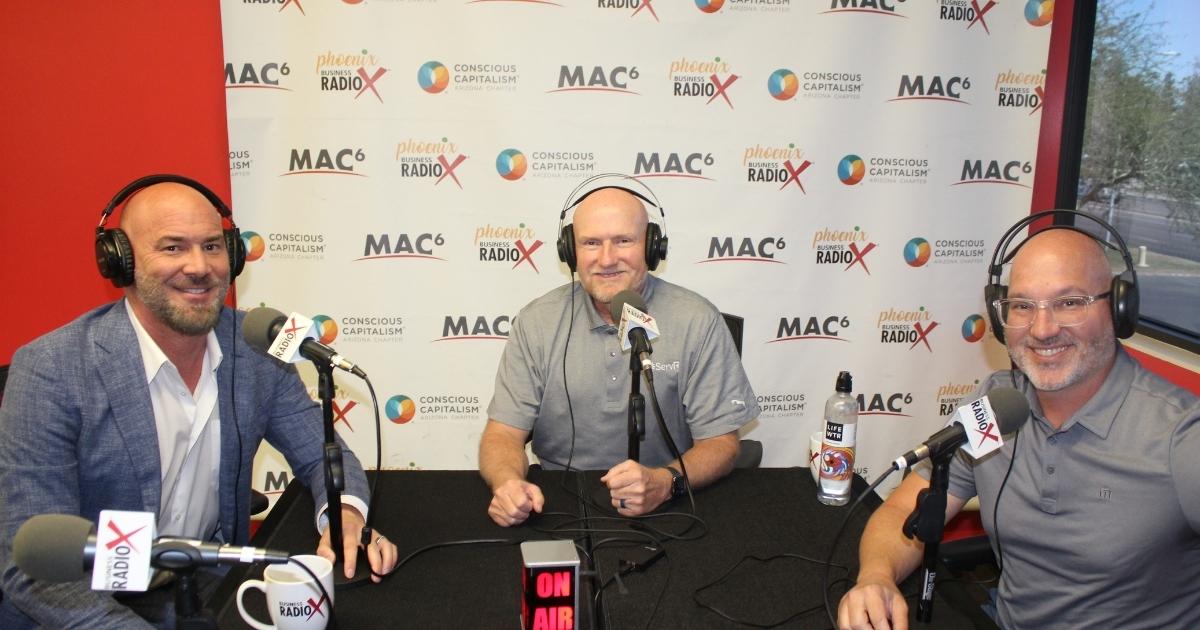 Todd Delano, Breck Rice and a host wearing headphones in the Phoenix Business RadioX studio