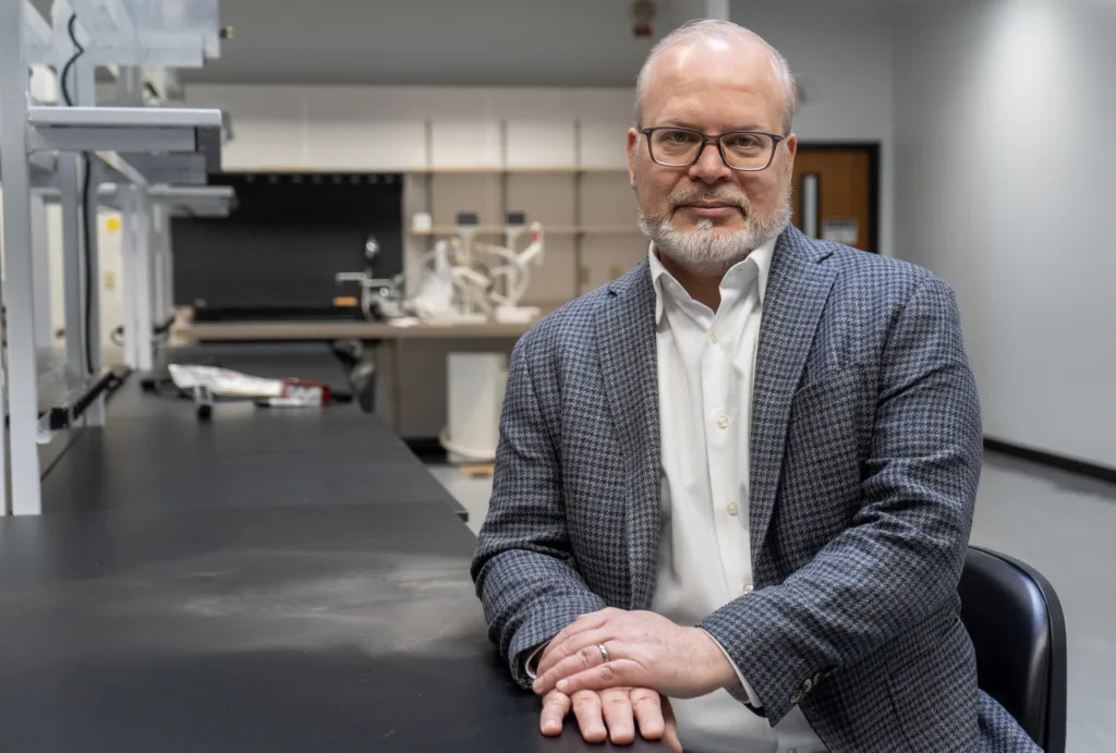Tom Cirrito seated at a laboratory bench inside Varro's St. Louis facility