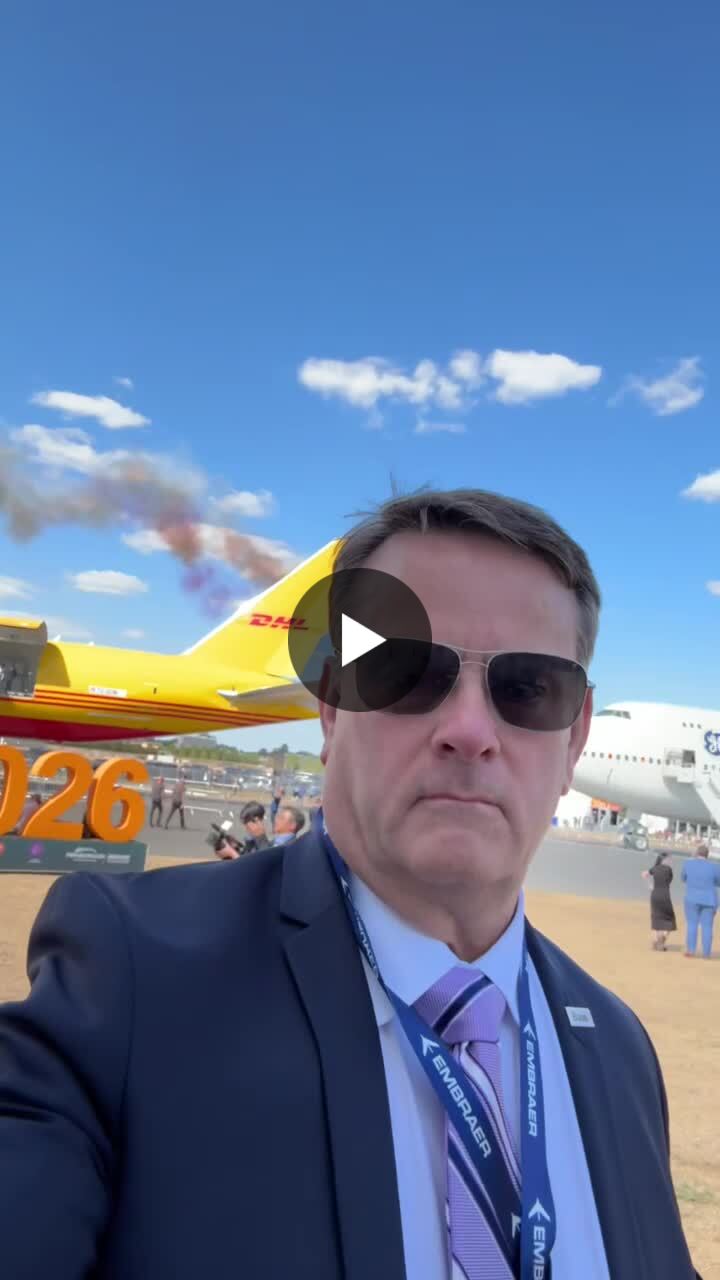 Tom Hennessey at the 2026 Farnborough International Airshow, with aircraft on display behind him