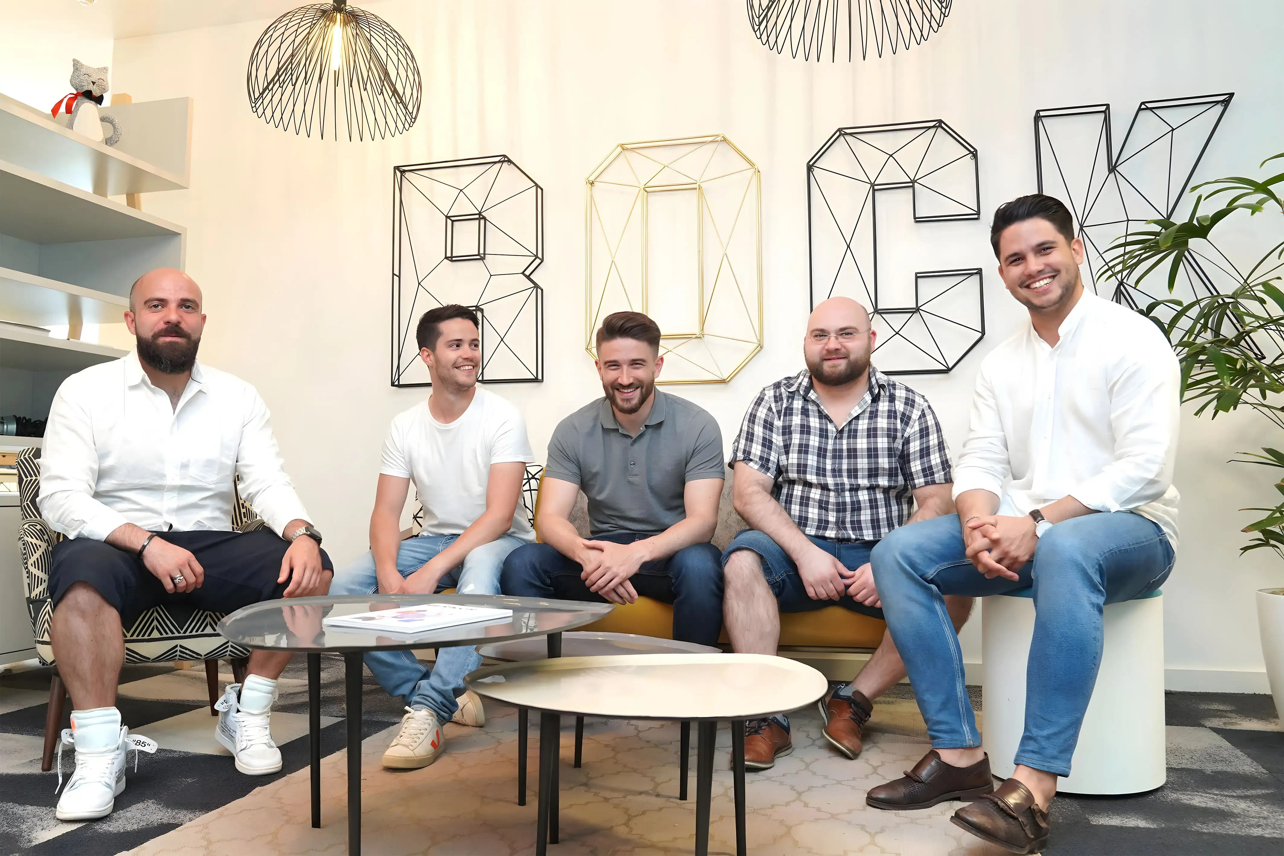 Salonkee’s five co-founders seated together in an office lounge