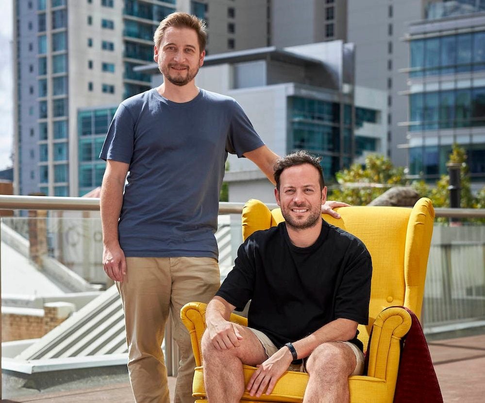 Tom Wright, left, with Cascade colleague Karim Zuhri in a 2022 press photograph
