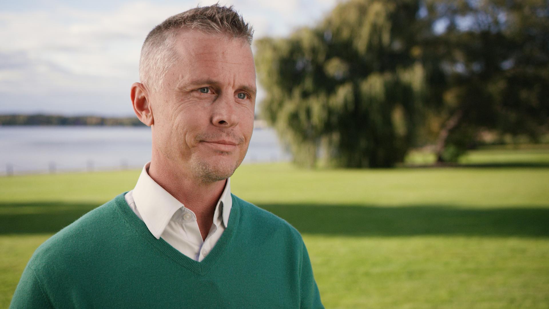 Tomas Liljeborg speaking outdoors in a Nordic Capital interview, wearing a green sweater