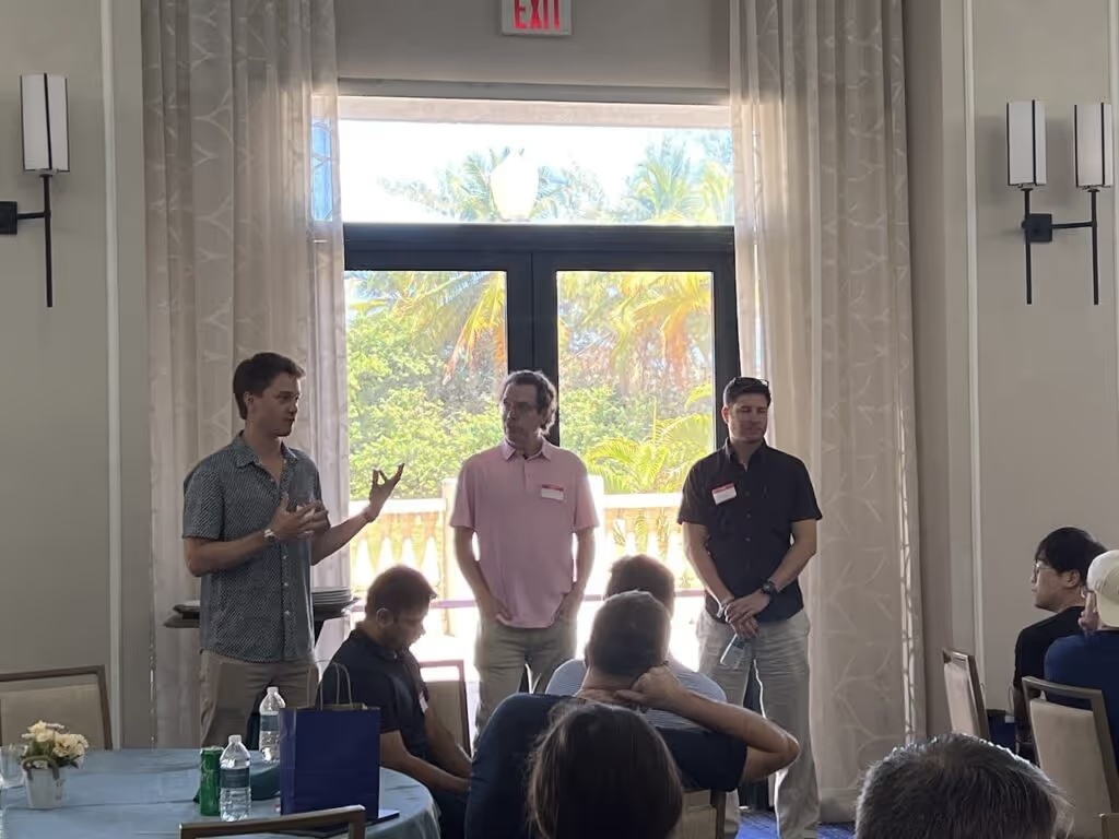 Michael Saltzman, Jonathan Lewin and Tomas Vykruta answer questions from colleagues at EvolutionIQ’s Puerto Rico offsite.