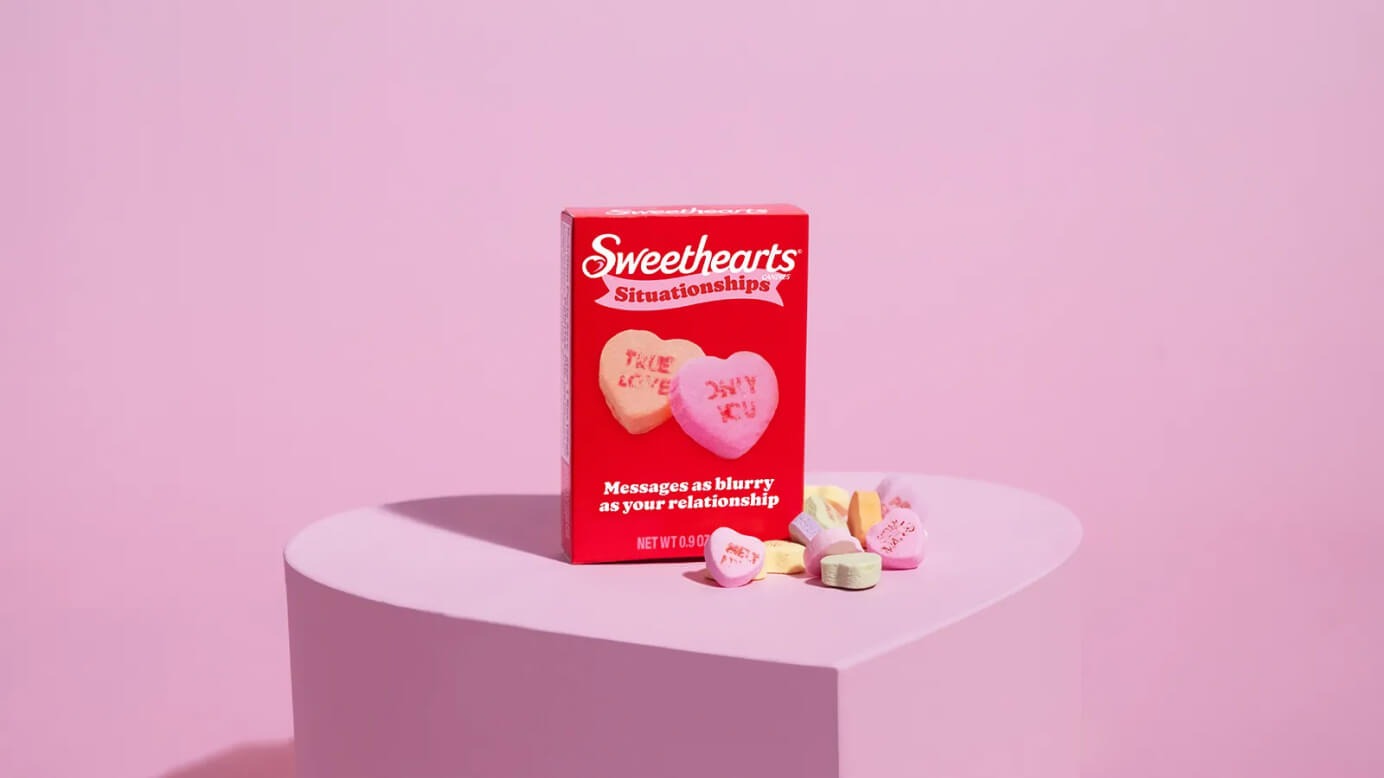 Sweethearts Situationships box on a pink heart-shaped pedestal