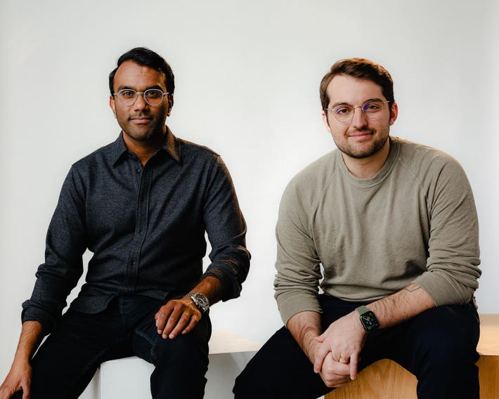 Tome cofounders Keith Peiris and Henri Liriani seated together