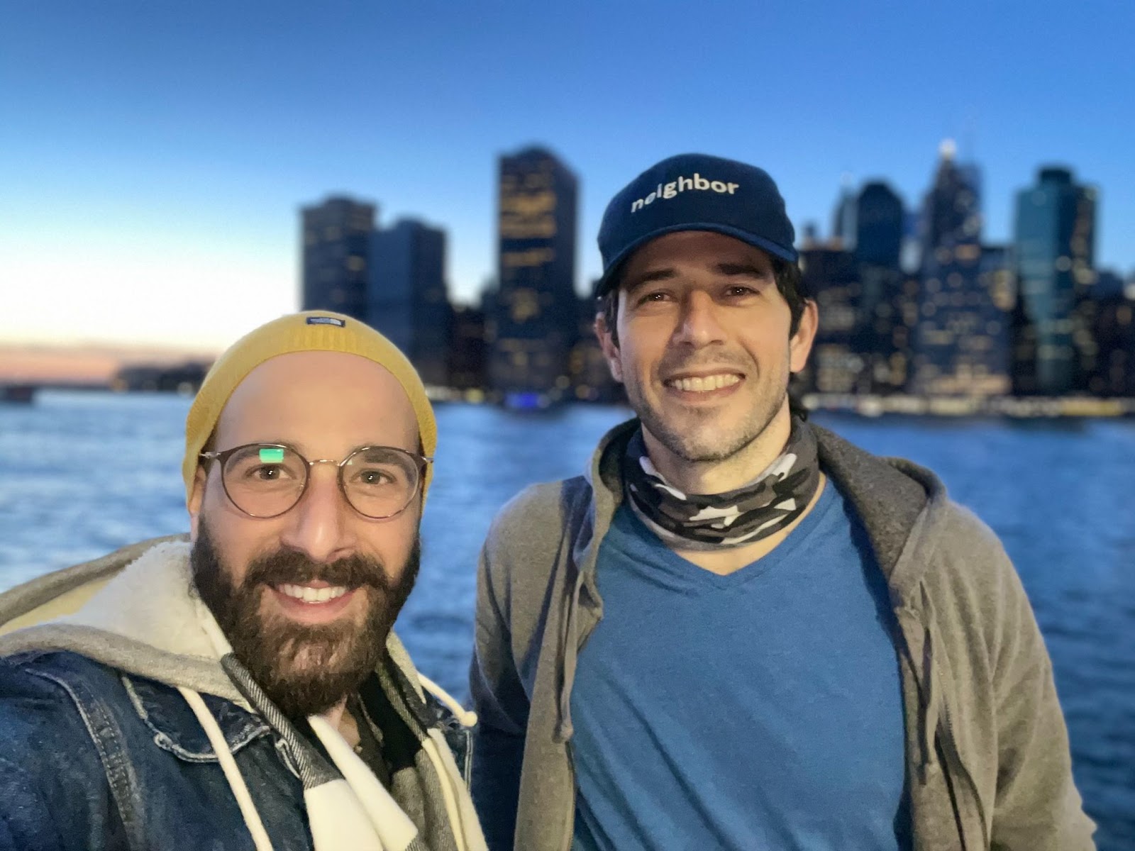 Per Diem co-founders Doron Segal, left, and Tomer Molovinsky, right, beside the New York waterfront in 2021
