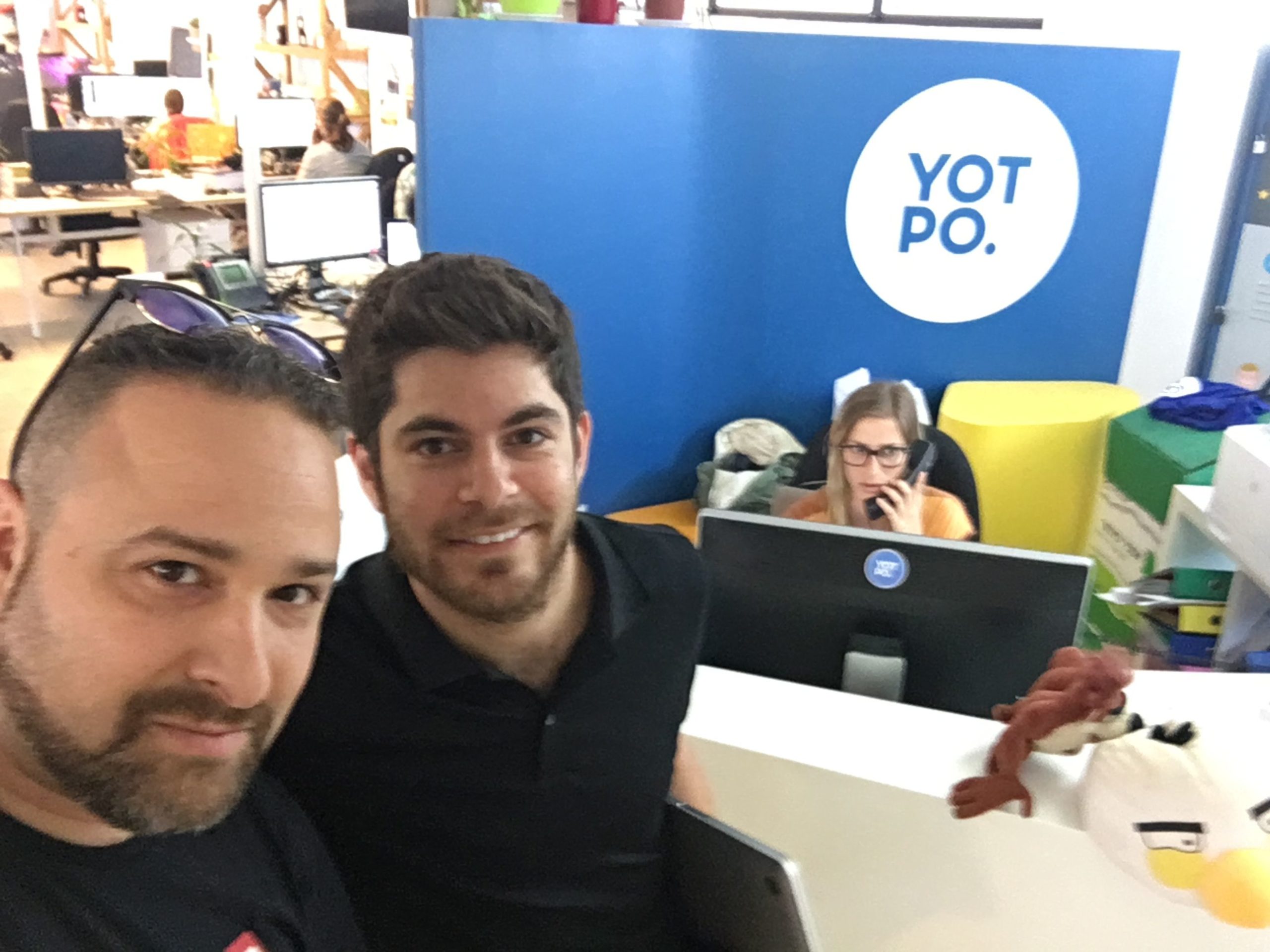 Tomer Tagrin, center, with colleagues in a Yotpo office