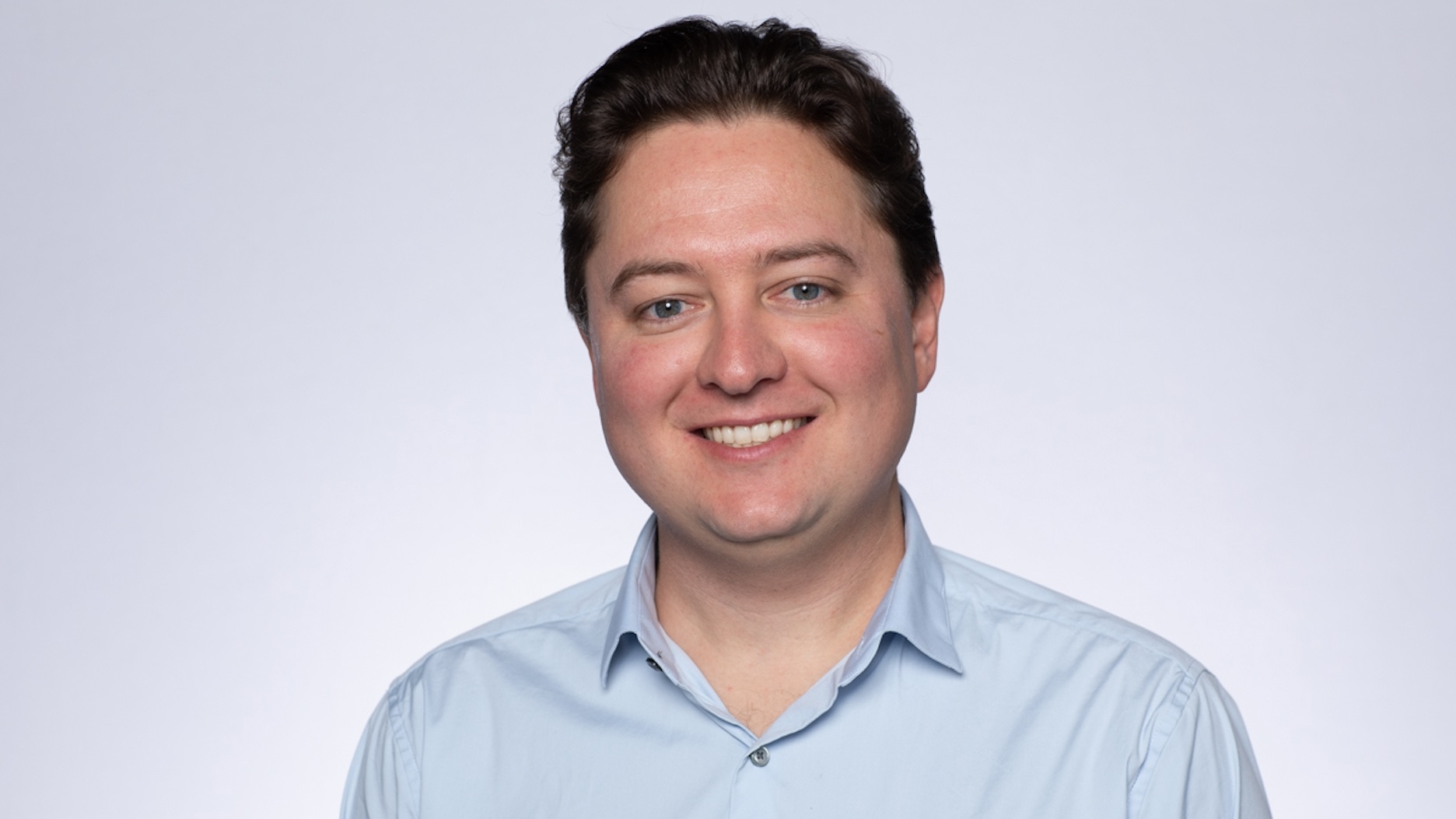 Torpago founder and CEO Brent Jackson seated indoors