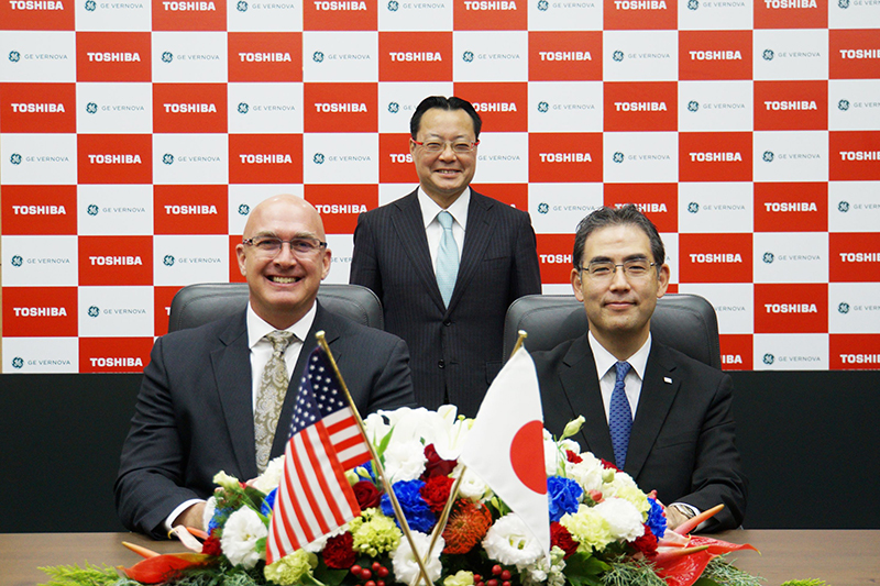 Toshiba and GE Vernova representatives at a memorandum of understanding signing ceremony in Kawasaki