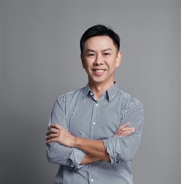 Toshio Nakama in a striped shirt, in the press portrait accompanying his 2024 interview