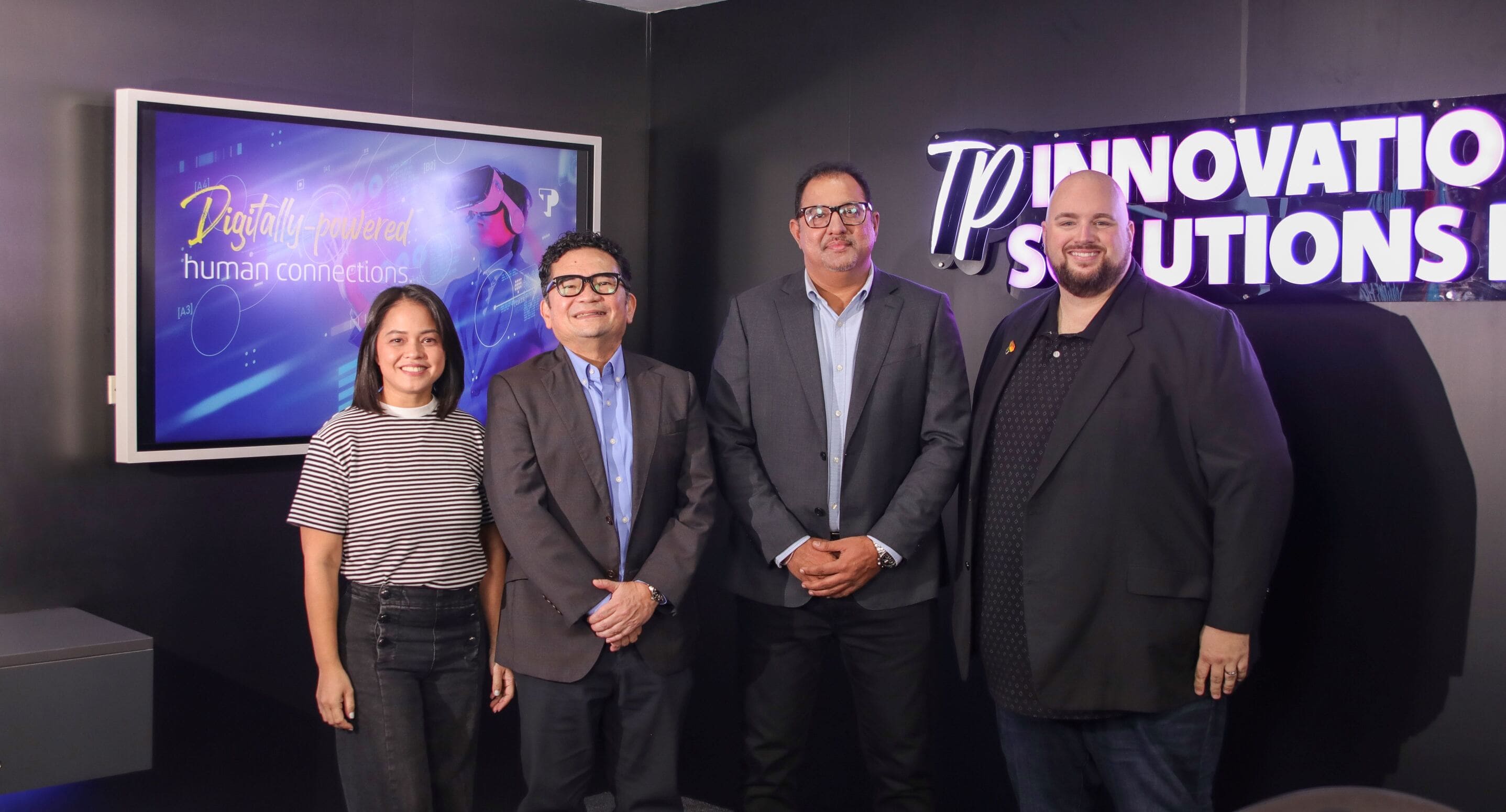 Four participants in the TP Philippines and IBPAP IT Factor podcast pose at an innovation space.