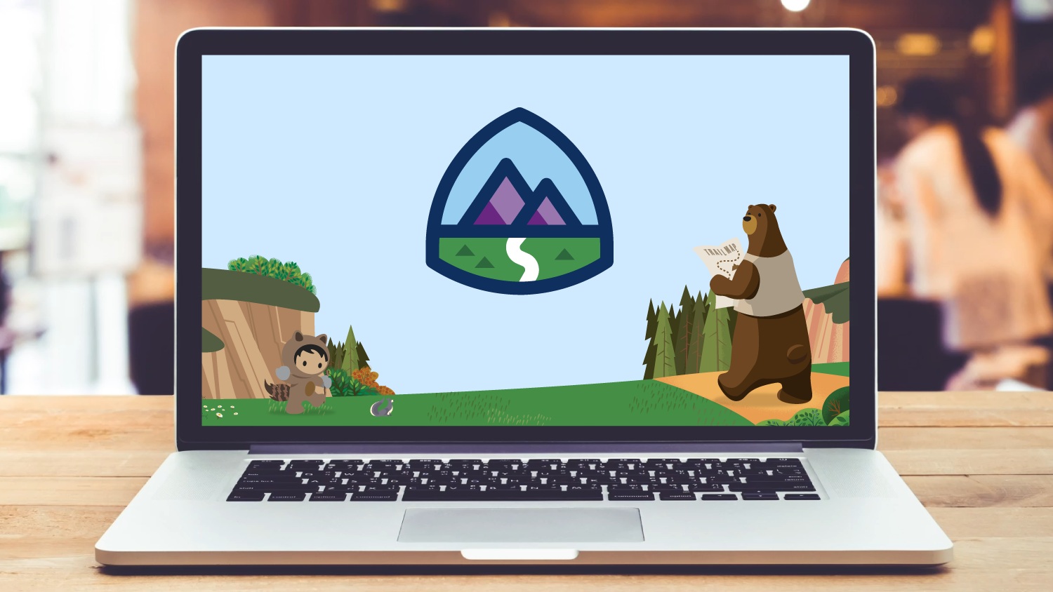 A laptop displaying Salesforce Trailhead in an office setting