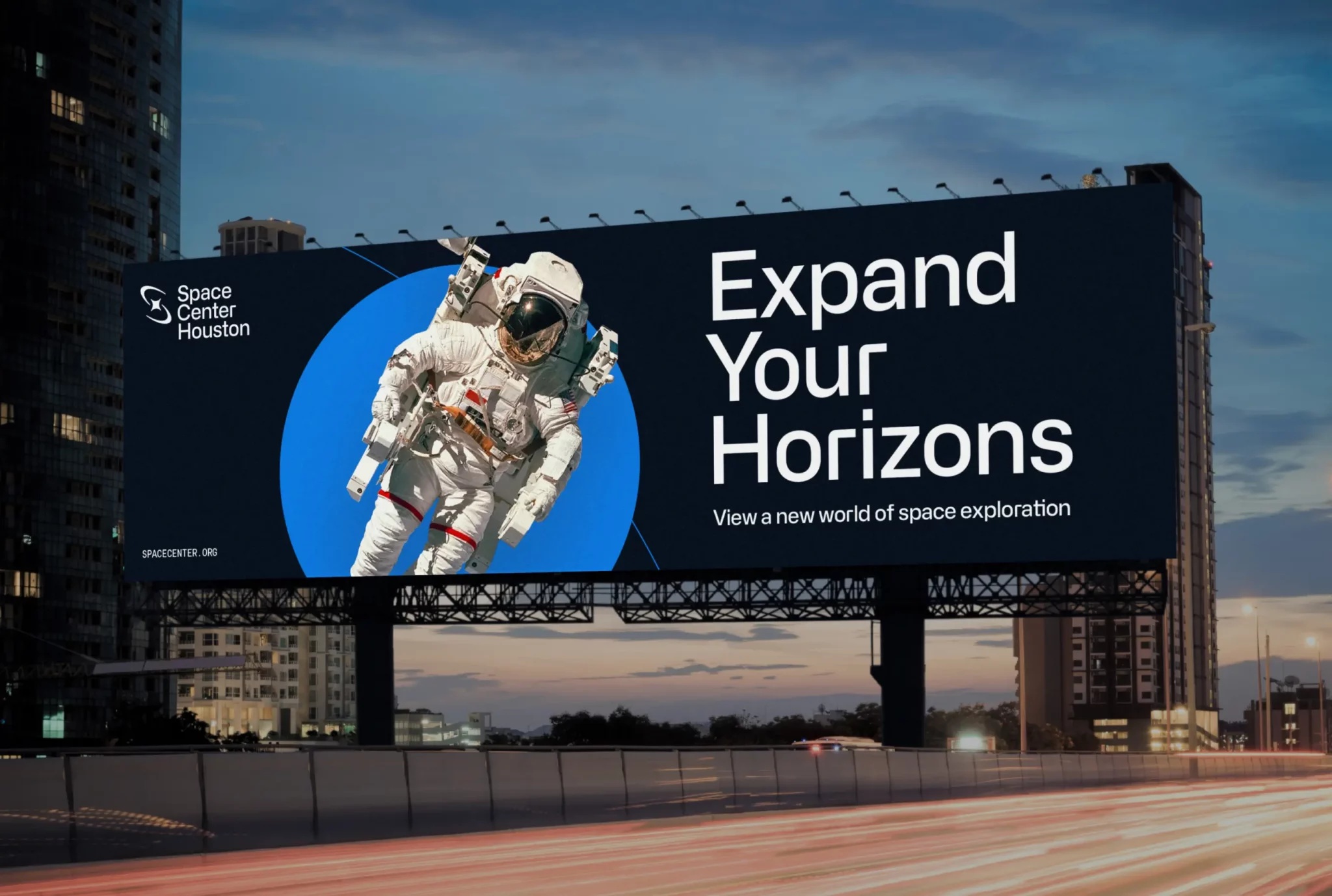 Space Center Houston billboard design with an astronaut and the words Expand Your Horizons