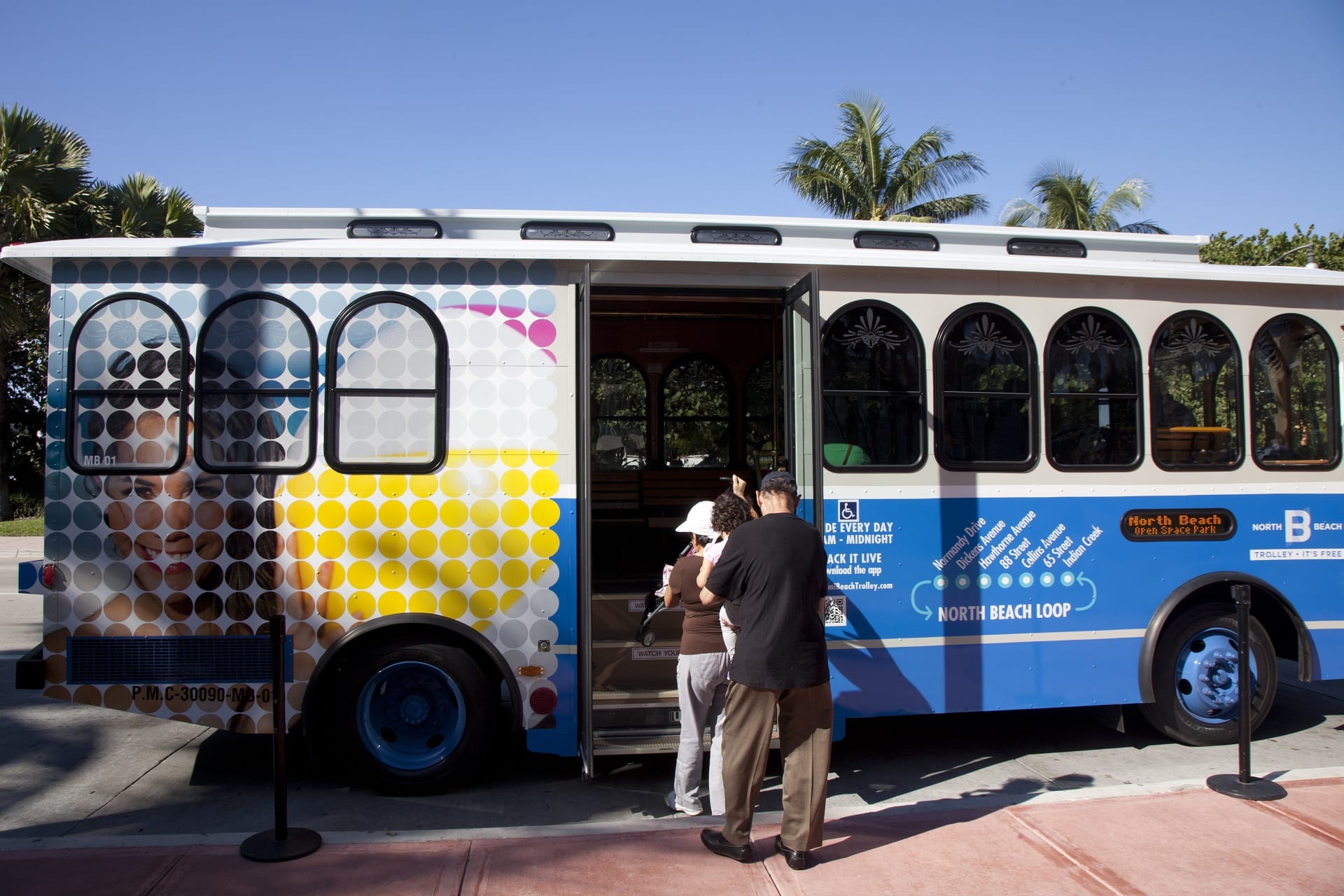 Passengers boarding a North Beach trolley pictured on Transportation America’s website