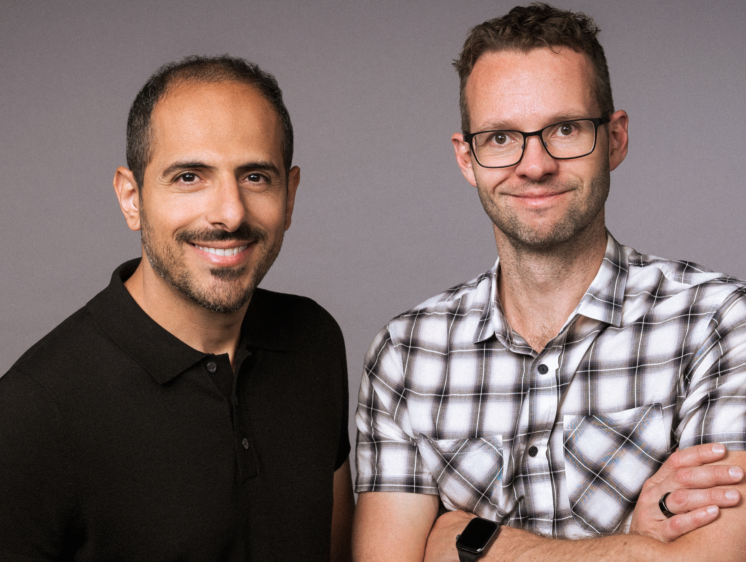 Resourcely co-founders Aladdin Almubayed, left, and Travis McPeak, right, standing together