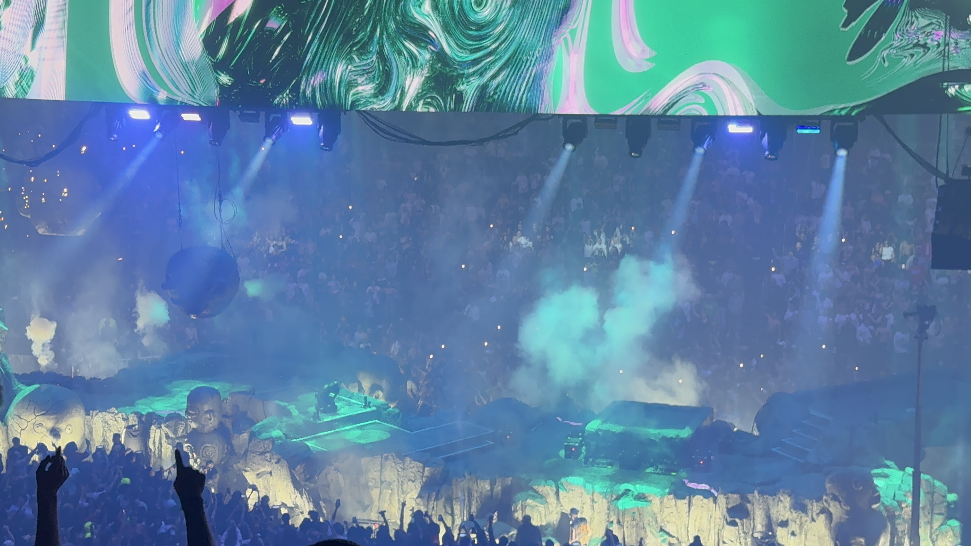 Travis Scott performs amid blue light on the Circus Maximus tour in Orlando in 2024