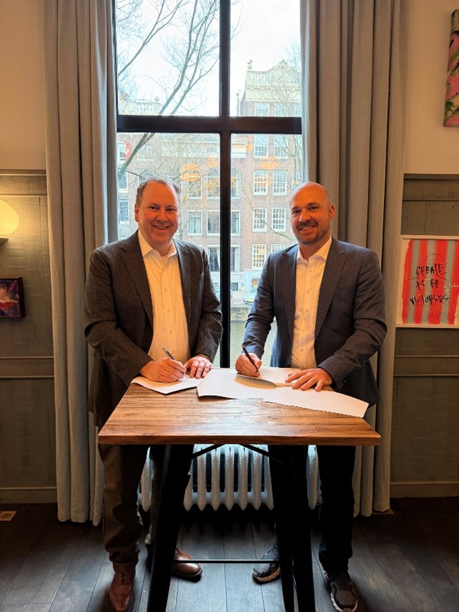 IPS and TRC executives signing their software implementation collaboration agreement