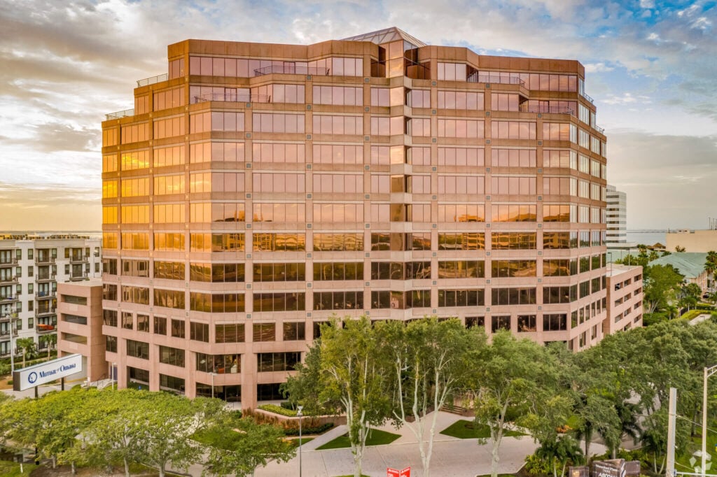 Aerial view of Trellance’s Tampa headquarters building beside the waterfront
