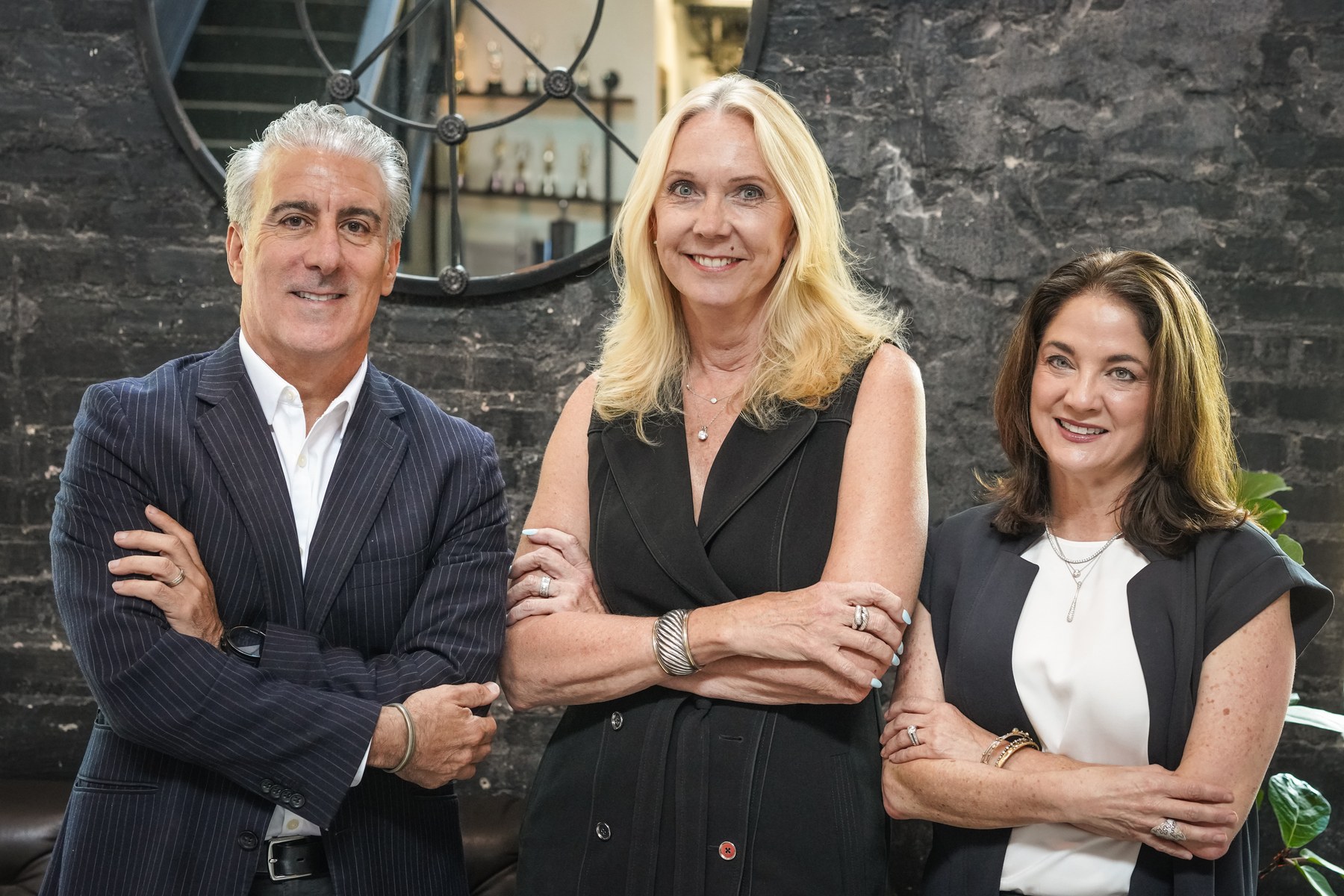 Dean Trevelino, Anne Marsden and Genna Keller together after the Marsden Marketing acquisition