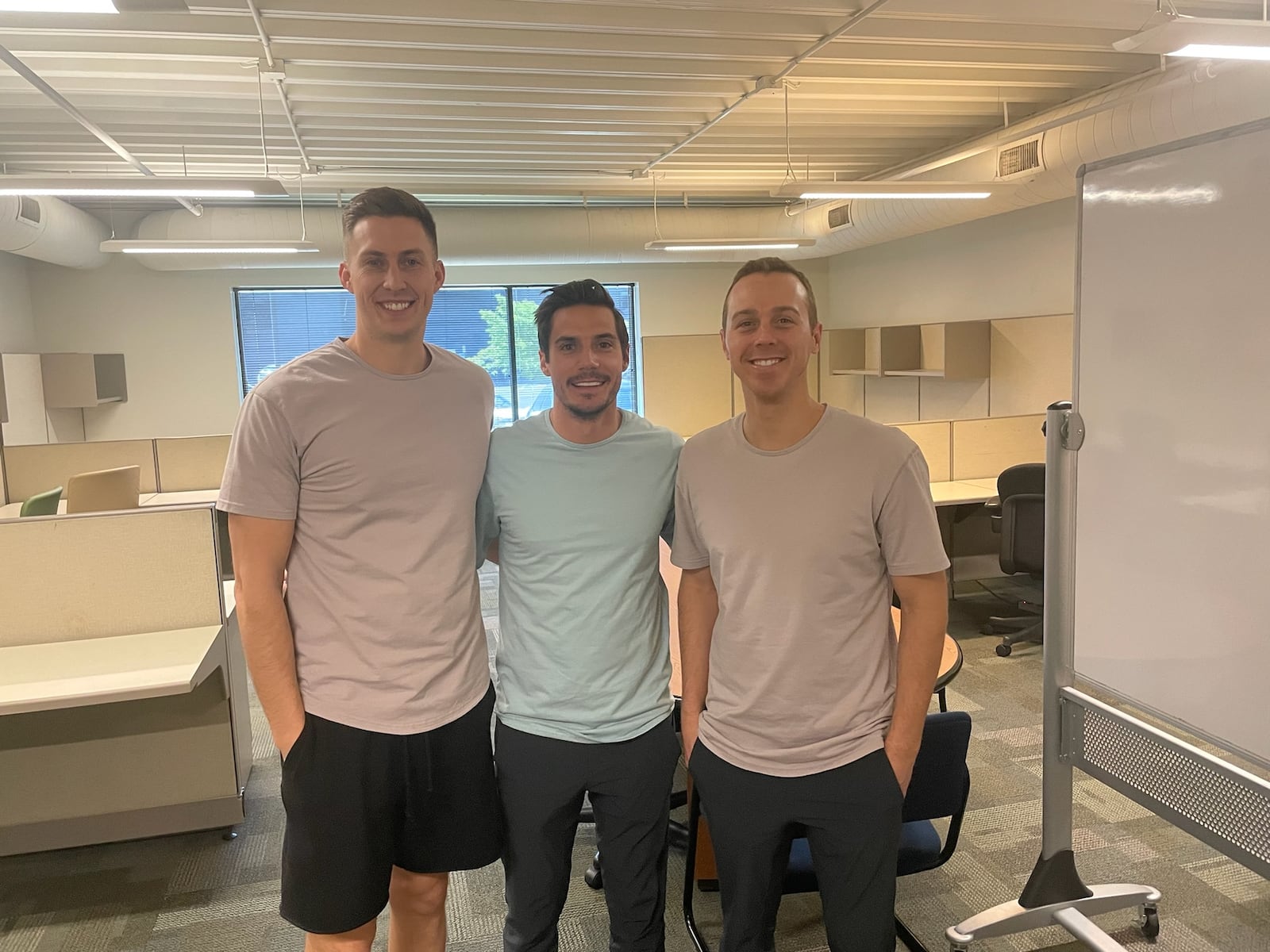 Trevor Larson, at left, with two Nectar colleagues in an office