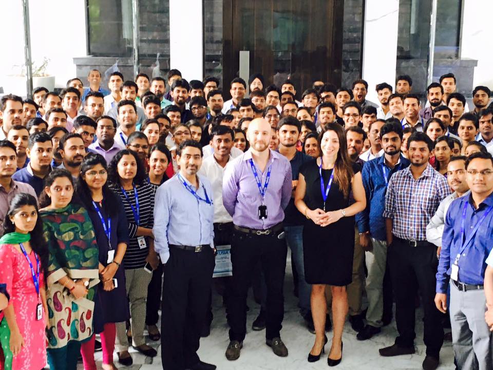 Trevor Silver standing with a large group of Exusia colleagues in Pune, India