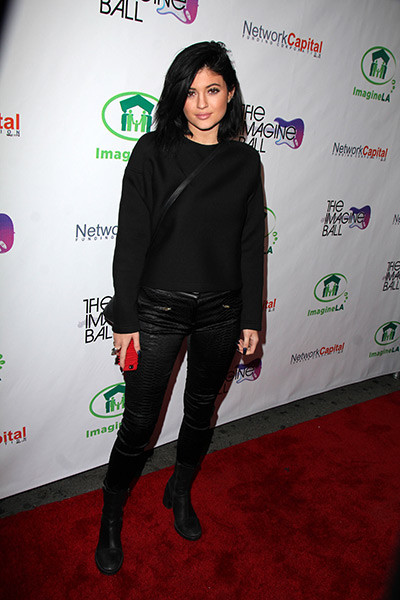 Kylie Jenner at the Imagine Ball, with Network Capital and Imagine LA names on the event backdrop