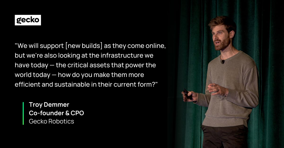 Troy Demmer speaking onstage during a presentation about existing critical infrastructure