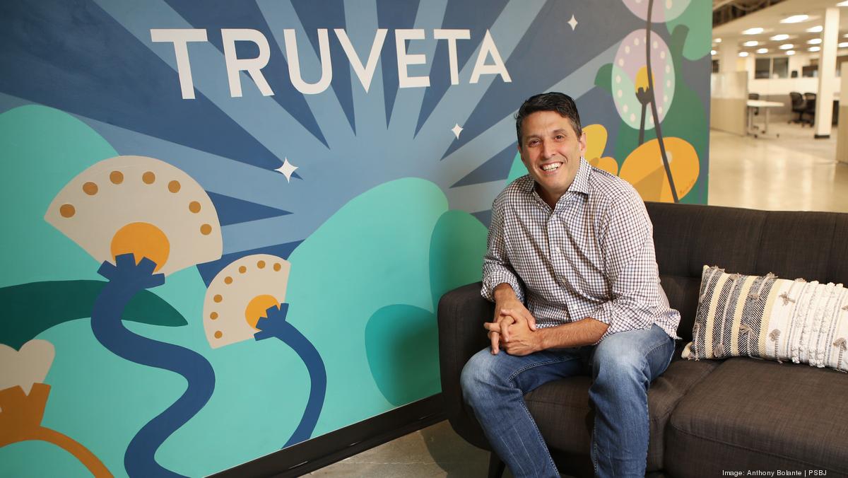 Truveta co-founder Terry Myerson seated in the company office