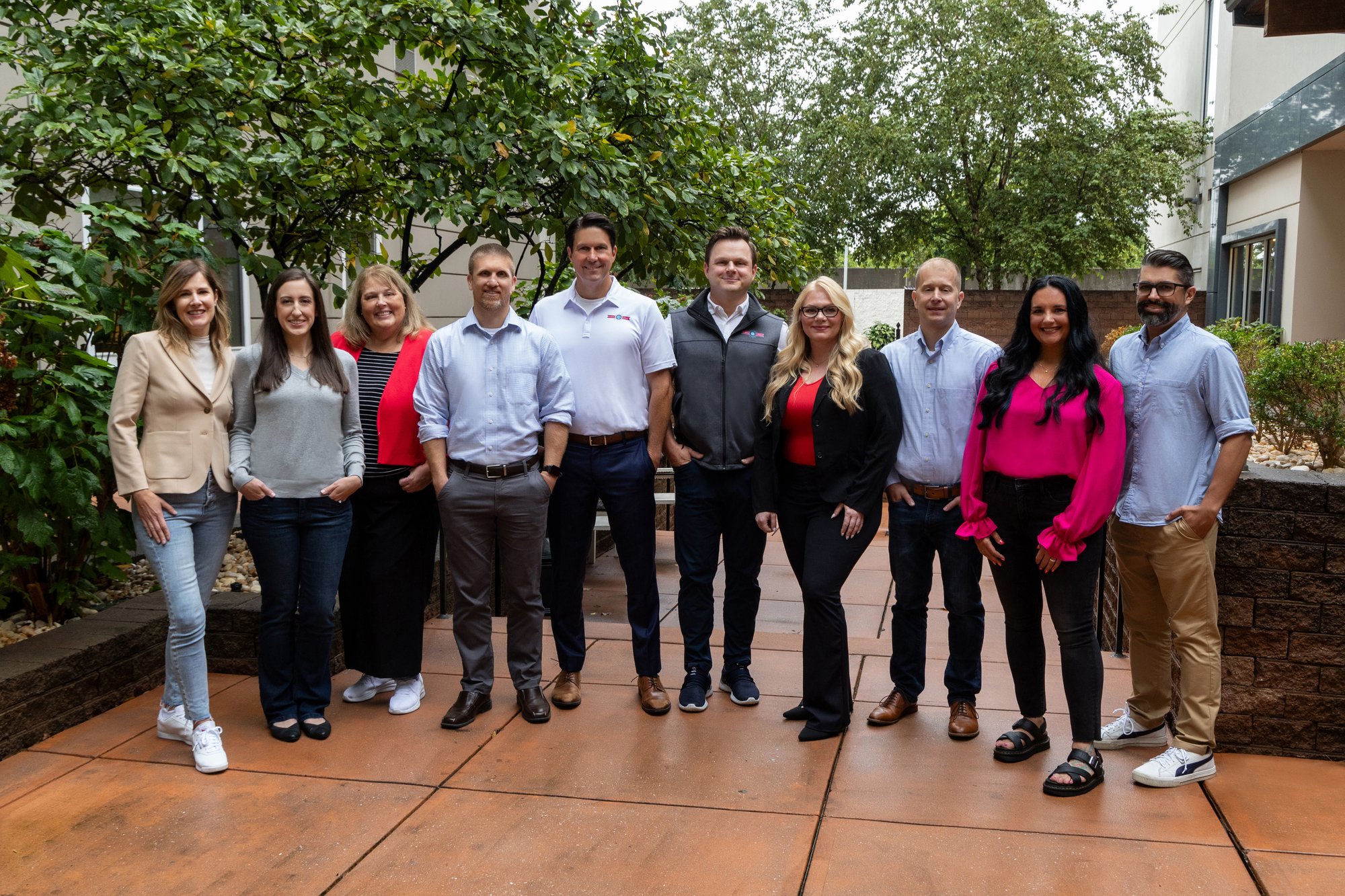 TSL leadership group standing together outdoors