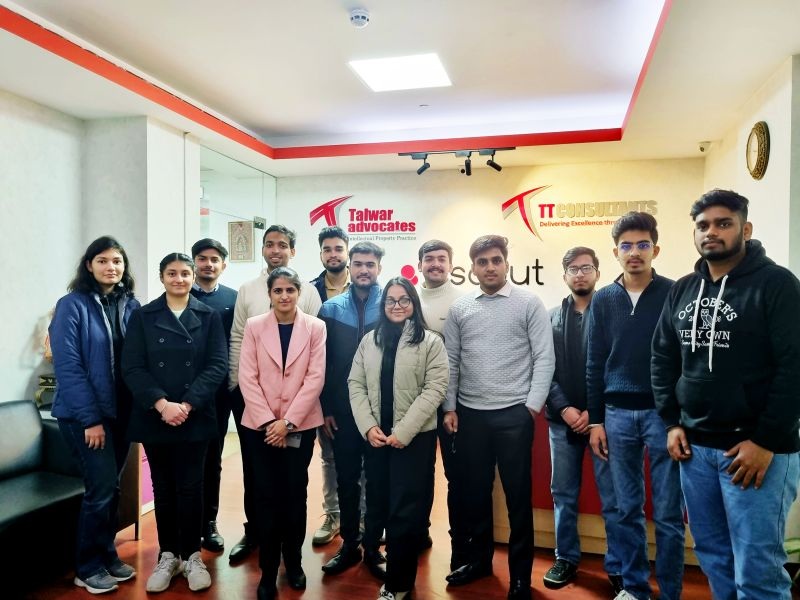 Thirteen new TT Consultants team members gathered in the company reception area